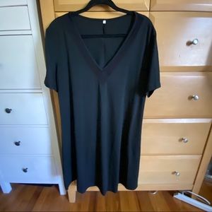 Black jersey dress with mesh neck line